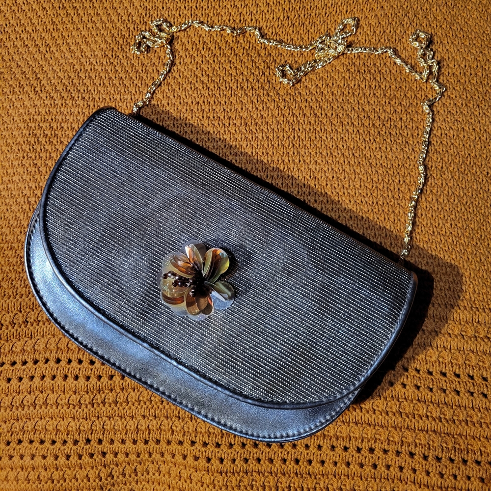 Elegant Black Clutch with Floral Accent